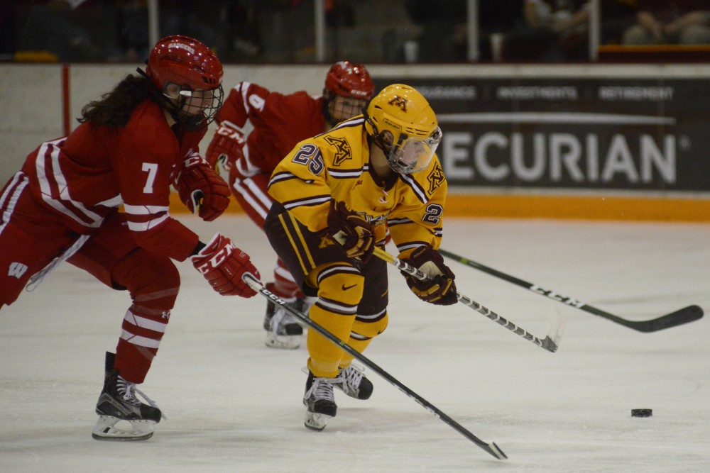 Nicole Schammel goes after the puck during the Gophers game against Wisconsin at Ridder Arena in Minneapolis on Saturday, Feb. 18, 2017.