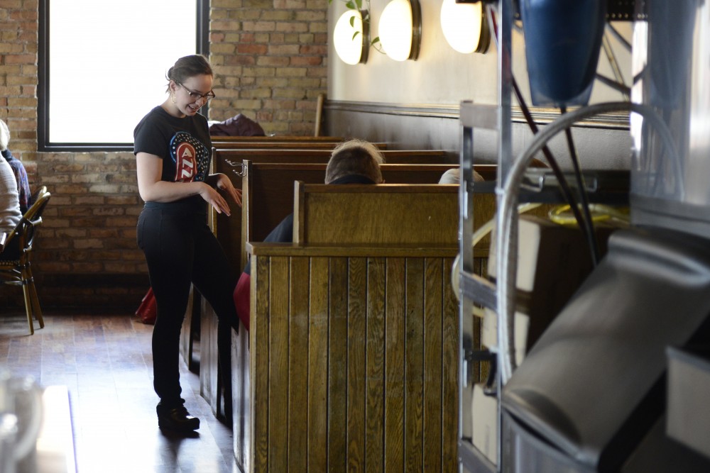 Emma Fowler takes a customers order at Annies Parlour on Monday, February 27, 2017 in Dinkytown. University businesses are looking to prepare for $15 minimum wage. 