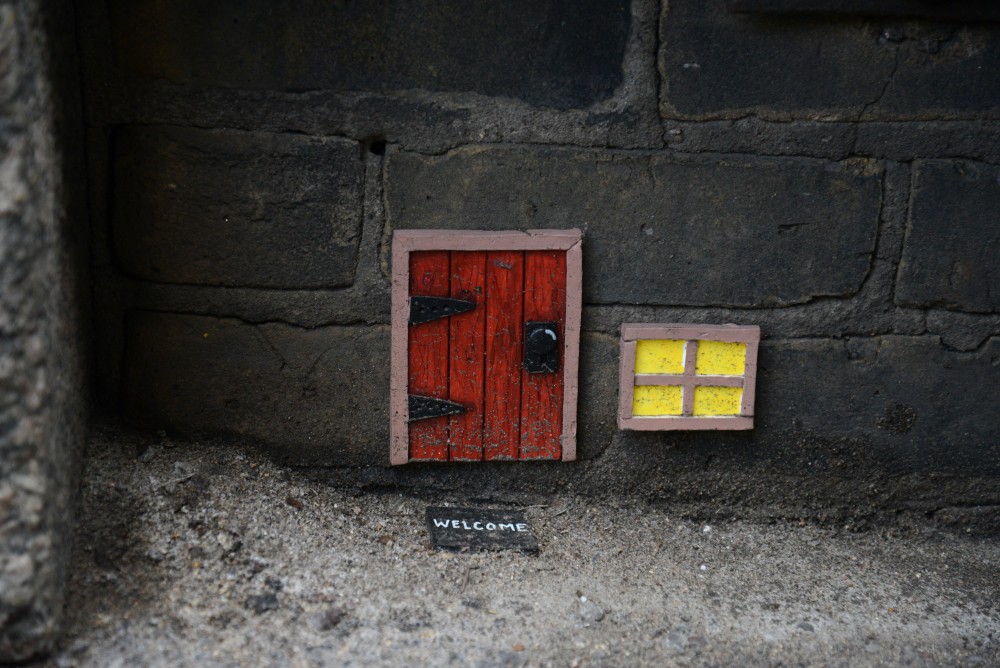 An artist by the name of Mows installs mouse doors in Minneapolis on Tuesday, March 8, 2017. This door located in a alley on N 4th street in Downtown Minneapolis. 
