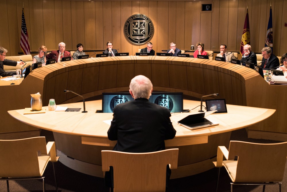 The Universitys Board of Regents talk at a meeting on June 10, 2016. 