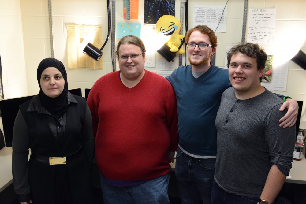Mona Minkara poses for a portrait in Kolthoff Hall with her team on Tuesday, March 20, 2017. Minkara is the Universitys first blind, female, computational chemist. 