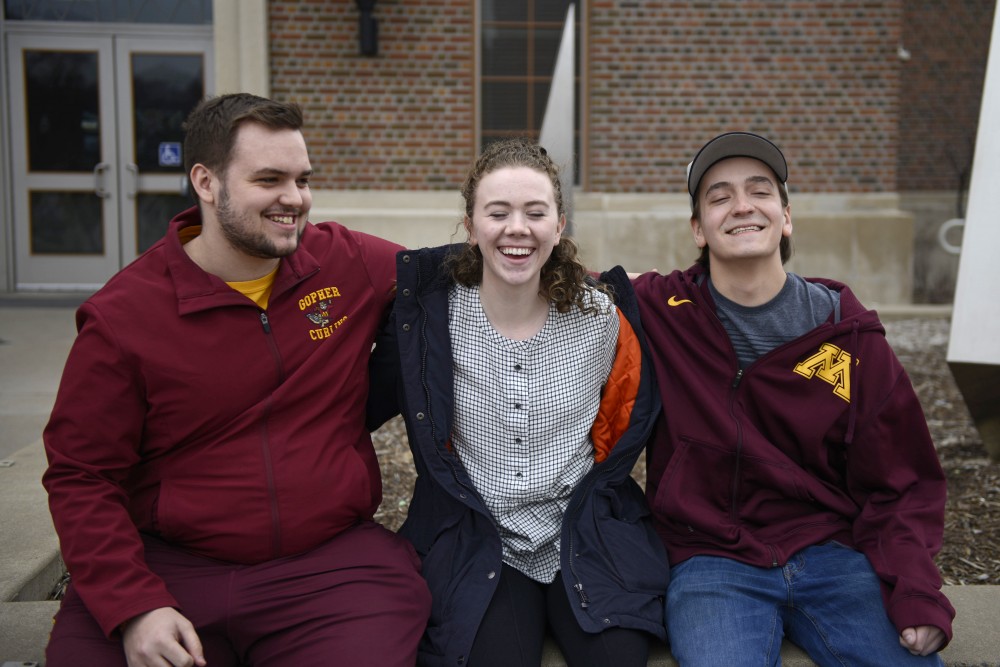 From left, members of the Universitys curling club Wes Leksell, Katie Kaseno, and Hunter Welch, pose for a photo outside of Coffman Memorial Union on Friday, March 24, 2017. The club won the 2017 USA Curling College Championship, its second national championship,  in March.