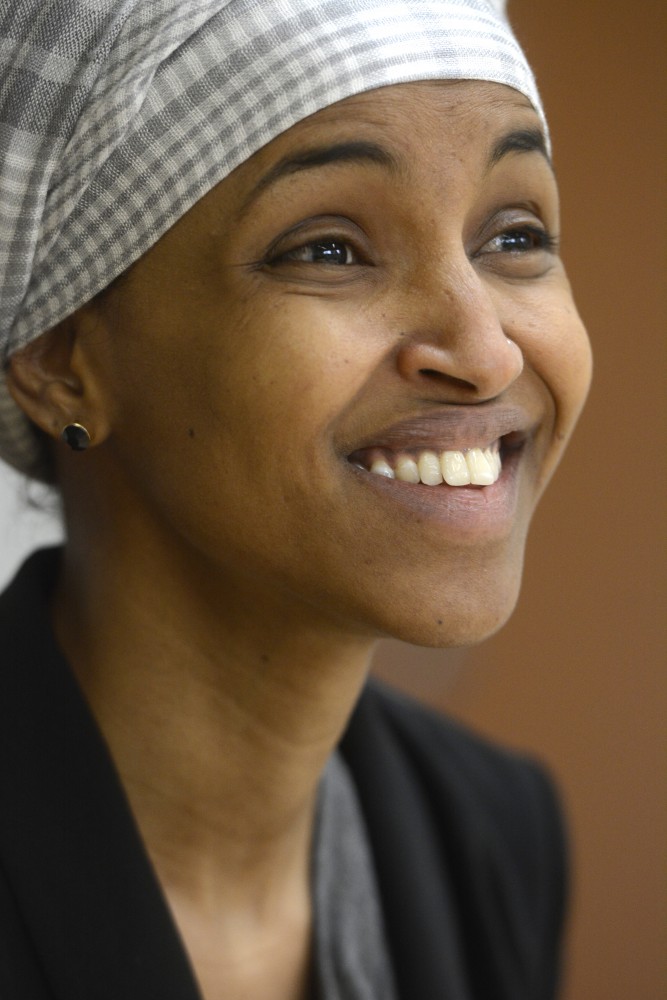 Rep. Ilhan Omar, DFL-Minneapolis, fields questions from the Minnesota Daily on Friday, Mar. 24 at the Center for New Americans and Law Clinic in Mondale Hall.