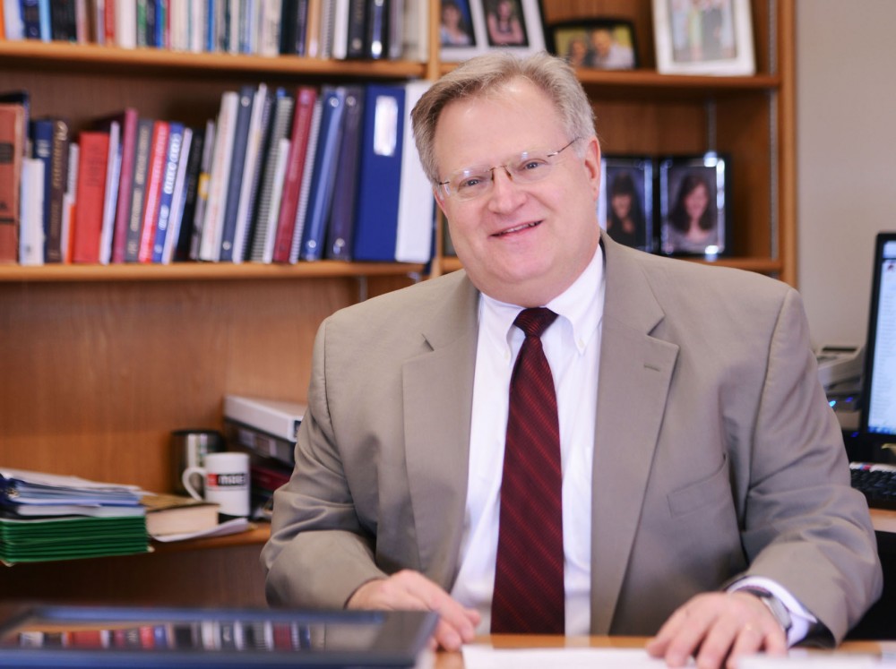 University Dean of Humphrey School of Public Affairs Eric Schwartz on Wednesday, April 24, 2013, in his office. Schwartz was recently nominated to the US Commission on International Religious Freedom, which monitors different circumstances overseas where religious freedom is endangered.