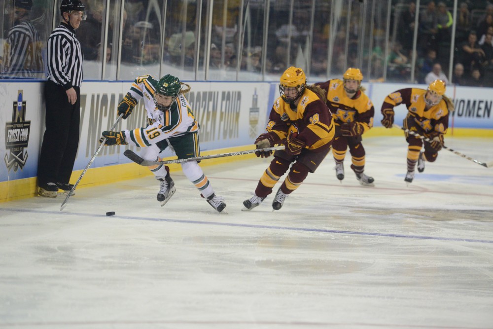 Sophomore forward Loren Gabel handles the puck on Friday, Mar. 17, 2017 in St. Charles, Missouri at the Family Arena. The Gophers lost 4-3 against Clarkson University Golden Knights.