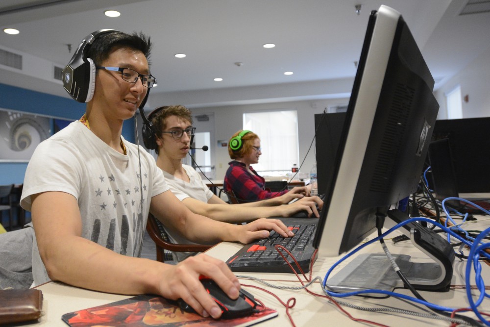 Genetics junior Edward Zhai, left, Technical Writing sophomore Nathan Ernst, middle, and Political Science and History junior Nick Dutoit play League of Legends on Saturday, April 1, 2017 at Argyle House. Theres different competitive scenes around the world. Its fun to analyze different tendencies, Ernst said. 