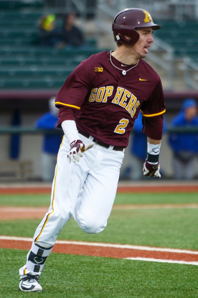 Sophomore Alex Boxwell runs to first base during the Gophers game against South Dakota State at Siebert Field on April 13.