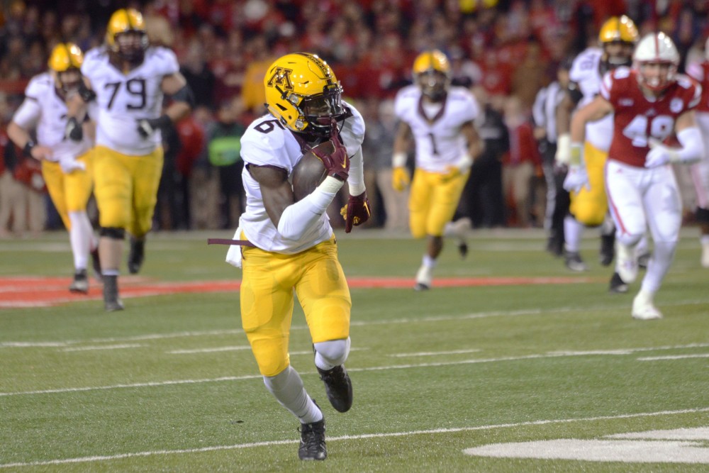 Gophers wide receiver Tyler Johnson runs the ball down the field against the Cornhuskers at Memorial Stadium in Lincoln, Nebraska on Saturday, Nov. 12, 2016.