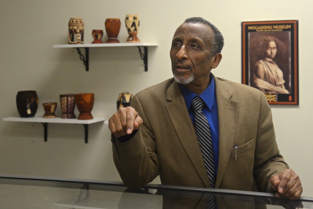 Osman Mohamed Ali speaks about some of the 700 artifacts in the museums collection at the Somali Museum of Minnesota on Friday, April 14, 2017 in Minneapolis.