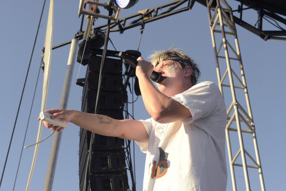 Robert DeLong performs his set at Spring Jam on Saturday, April 22, 2017. The artist uses different technologies, such as a Wii remote, to control lighting during his performances. 