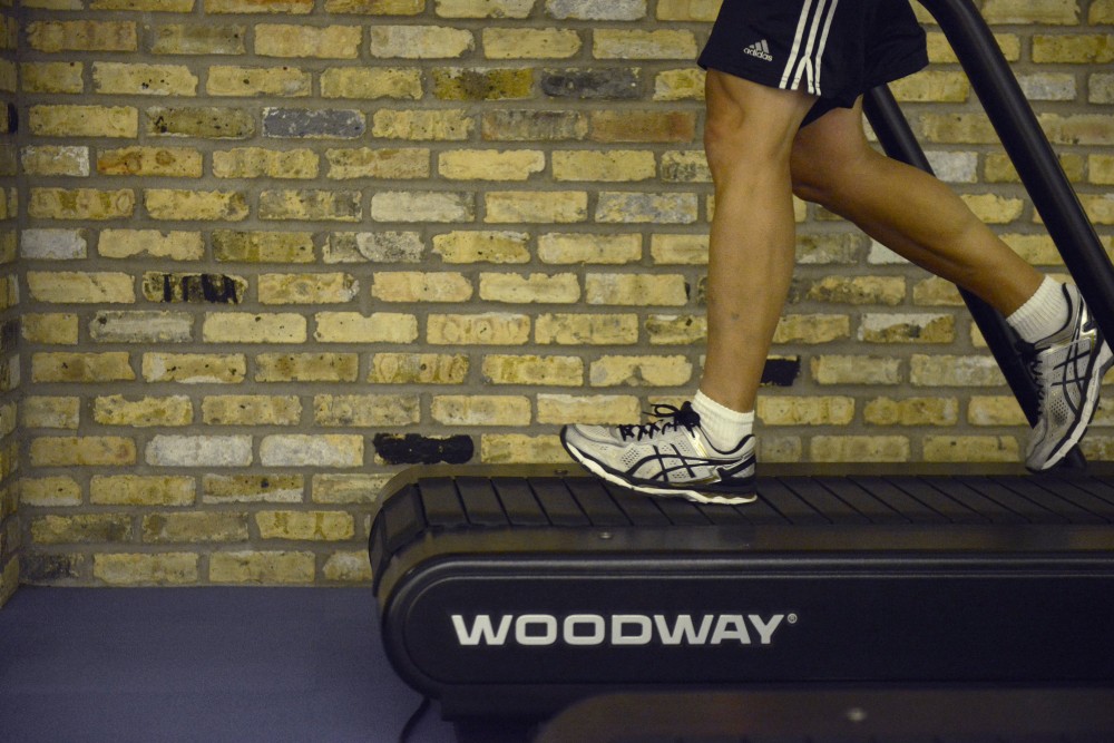 Pete Steinhagen, whos wife is a University alum, runs on the treadmill at the St. Paul Gym. 
