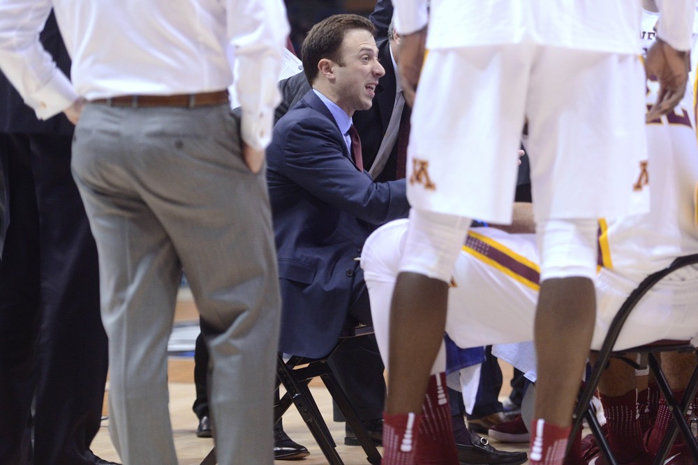 Gophers mens basketball Head Coach Richard Pitino talks to his team during a timeout on Thursday, March 16, 2017 in Milwaukee at the Bradley Center.