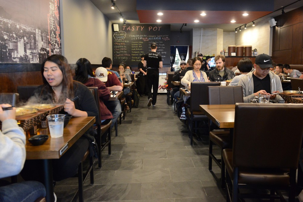 Patrons dine inside Tasty Pot in Dinkytown during a soft opening on Tuesday, May 30.