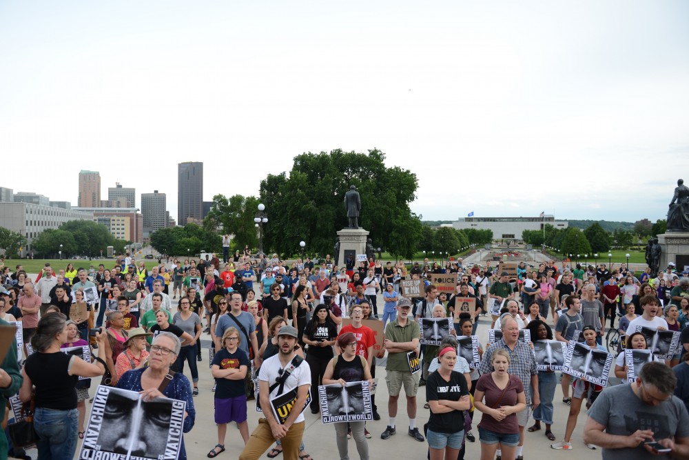 Protestors gather outside the State Capitol in St.Paul on Friday, June 16.