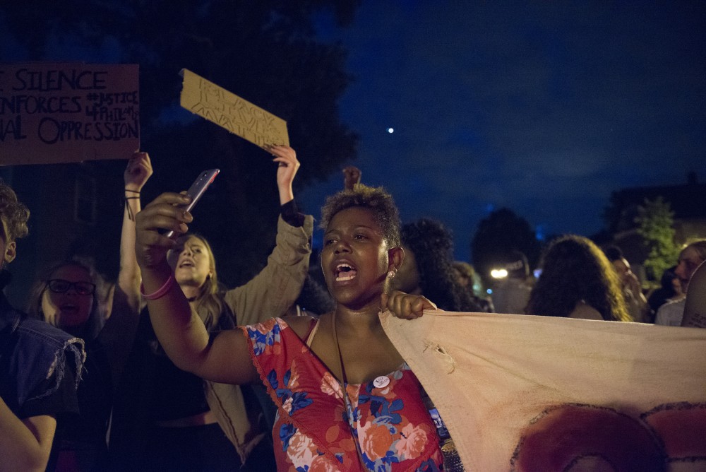 Erica Wright chants while protesting in St. Paul on Friday, June 16.