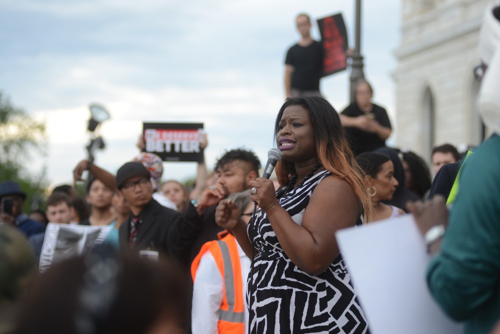 Nekima Levy-Pounds speaks during a protest outside the State Capitol building in St. Paul on Friday, June 16.