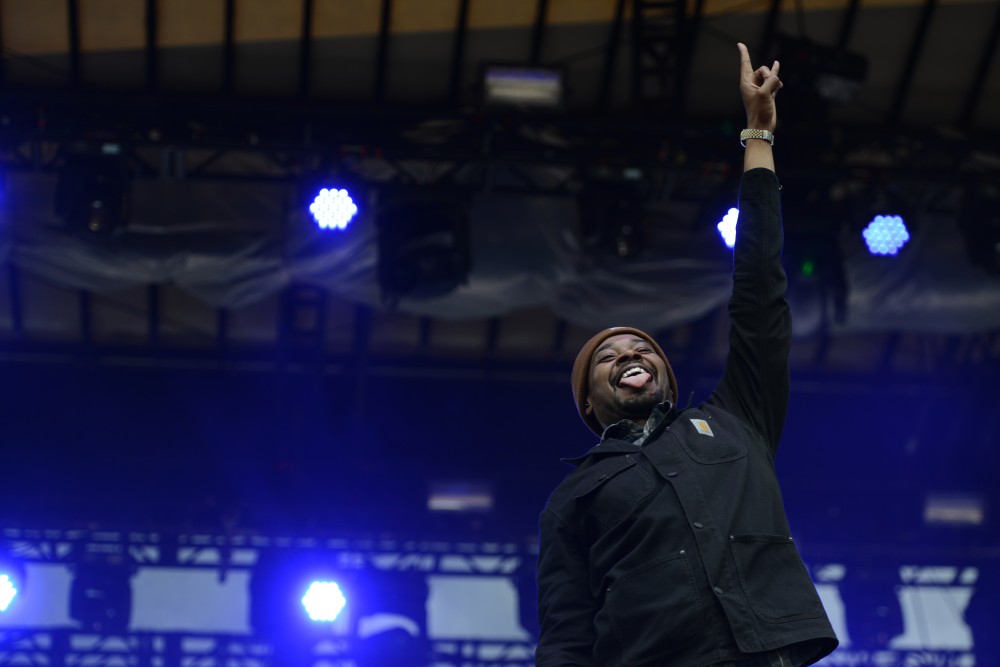 Danny Brown throws up his signature tongue-out, hands-up signal on Saturday, June 17, 2017 at Eaux Claires in Wisconsin. 