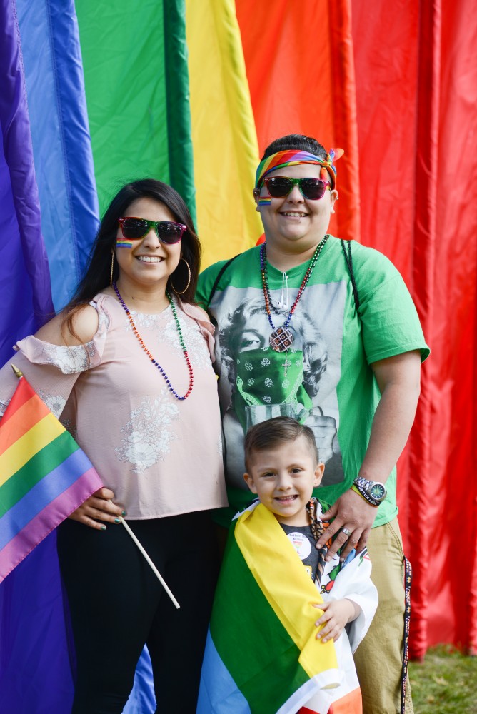 Marlen Cervantes, left, and Lilian Villagruna bring nephew Sergio Villagruna to pride in the park. 
Cervantes said the environment was welcoming and it is easy to express oneself at pride. 
