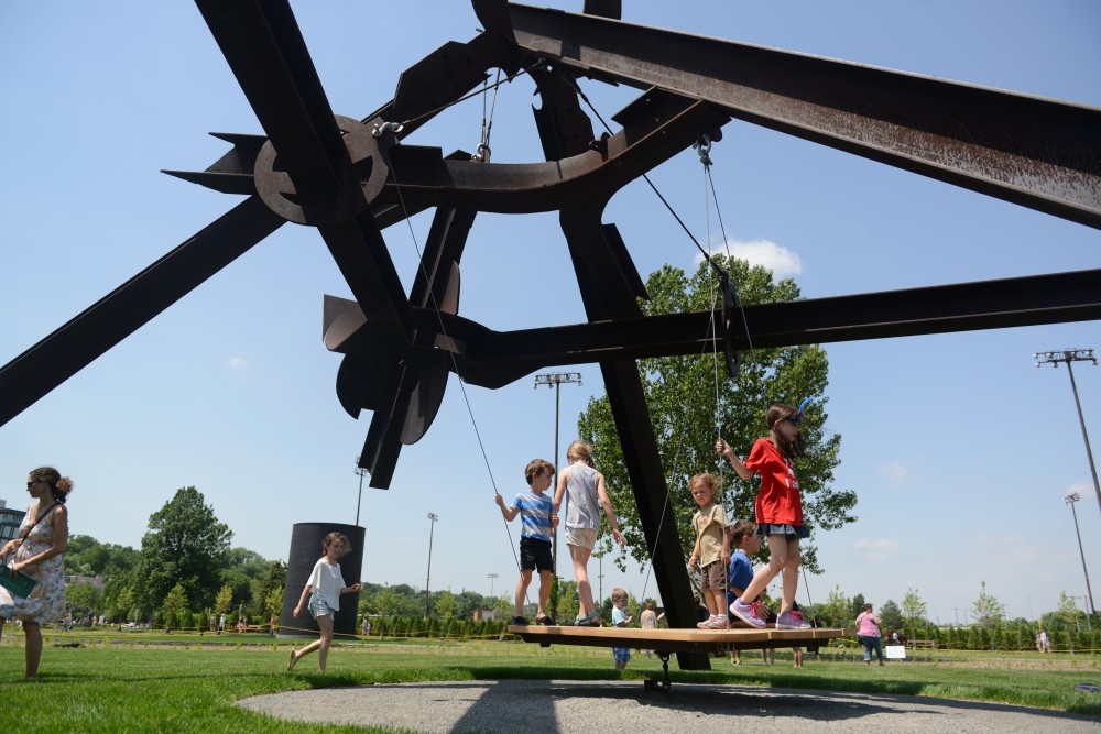 The Minneapolis Sculpture Garden reopened to the public on Saturday, June 10, 2017, drawing Minneapolitans of all ages outside the Walker Art Center to enjoy the public art space. 