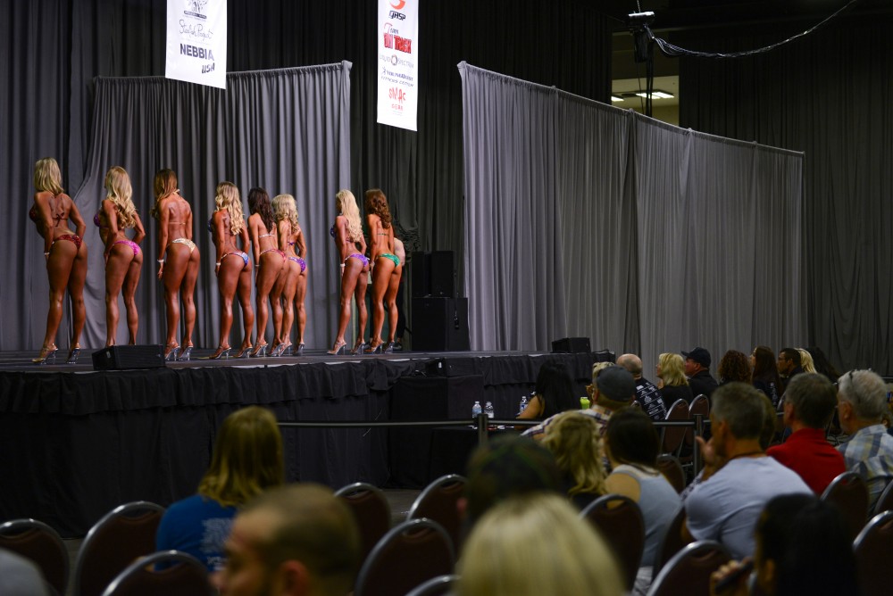 Contestants perform in physique, figure & bikini competitions in front of a crowd at the Minneapolis Convention center on Saturday June 10. 2017.