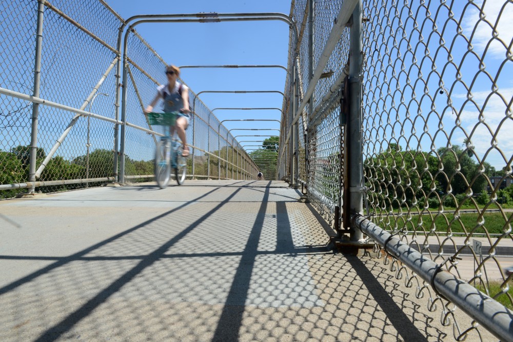 The 10th Street SE walking bridge is seen on Wednesday, June 21. The bridge, used to cross I-35W by cyclists and pedestrians, will undergo renovations in Spring 2018.