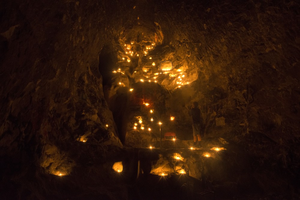 Cave explorers are known to light up spots in the cave with candles. Here, explorers set up 100 candles to illuminate a portion of the cave called stairway to heaven.