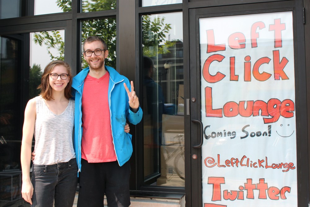Left Click Lounge owner Ryan Christianson poses for portraits with Alyssa Shoultz outside of the new space in Dinkytown on Sept. 1. 