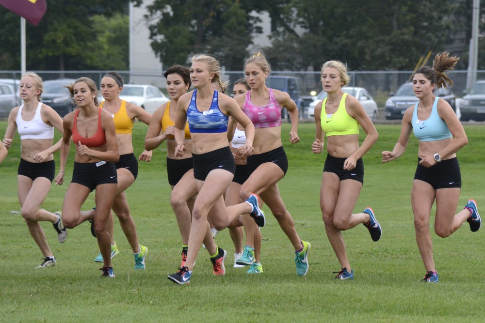 The Gophers womens cross country team prepares for the Indiana Open during the Intrasquad 5k on Sept. 1, 2017 at Les Bolstad Golf Course in St. Paul.