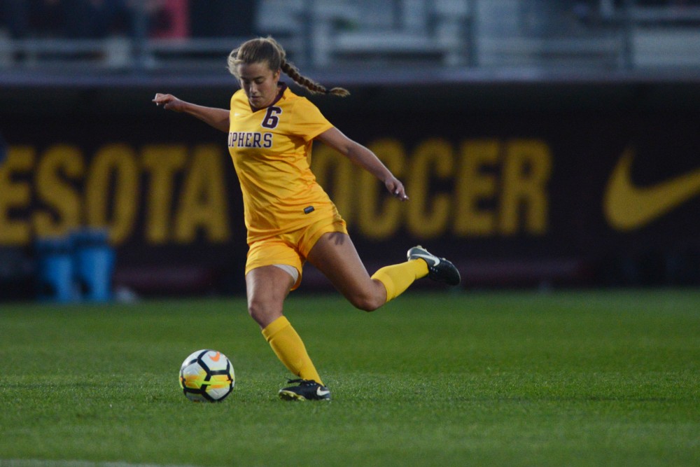 Midfielder Molly Fiedler kicks the ball during the Gophers match against Utah State at Elizabeth Lyle Robbie Stadium on Sept. 8.