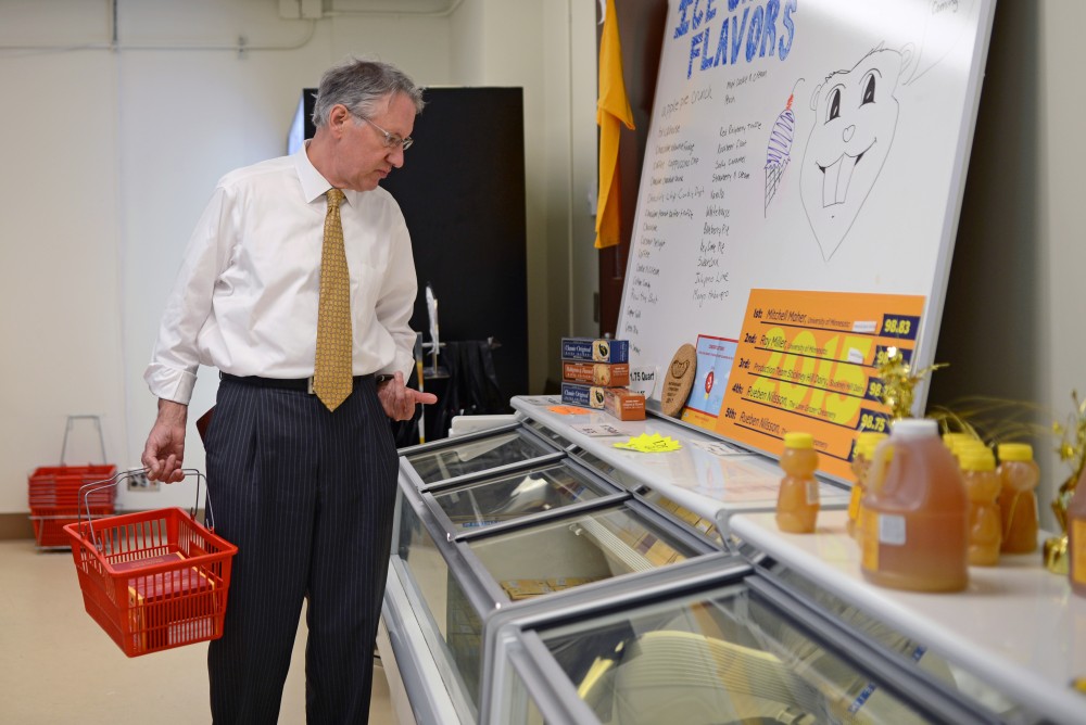 Phil Hewett looks over the ice cream flavors available at the dairy and meat salesroom in St.Paul on Wednesday. Sept. 6.  