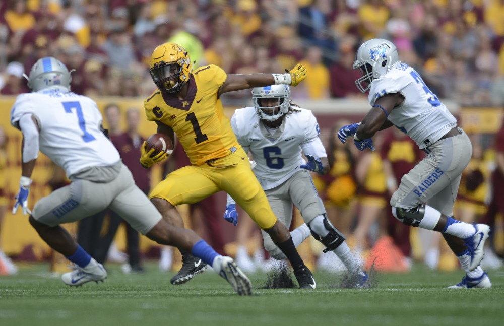 Running back Rodney Smith runs with the ball on Saturday, Sept. 16 at TCF Bank Stadium in Minneapolis. 