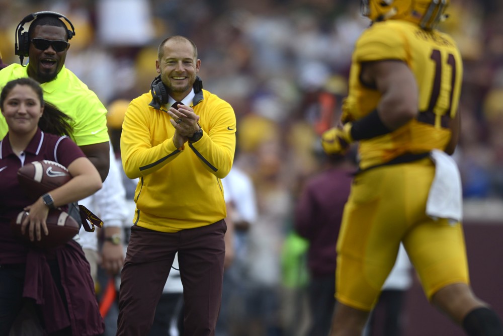 Head coach P.J. Fleck cheers on players after the Gophers scored a touchdown on Saturday, Sept. 16 at TCF Bank Stadium in Minneapolis. 