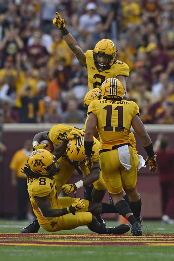 Members of the Gophers football team cheer after scoring a touchdown on Saturday, Sept. 16 at TCF Bank Stadium in Minneapolis. 