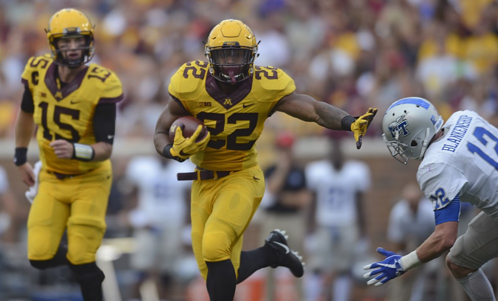 Running back Kobe McCrary runs with the ball on Saturday, Sept. 16 at TCF Bank Stadium in Minneapolis.