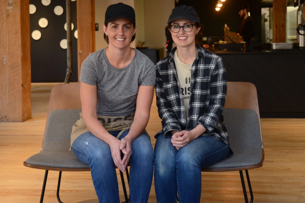 Sisters and shop owners Jen and Kate Lloyd sit at Rise Bagel Co. in Minneapolis on Tuesday. 