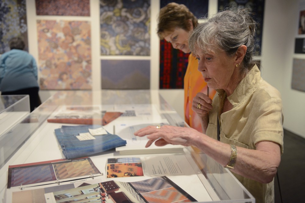 Nancy Kirby and Julie Kunin look at a display influenced by Jack Lenor Larsons textile innovation on Friday, Sept. 22 at the Goldstein Museum of Design in St. Paul. 