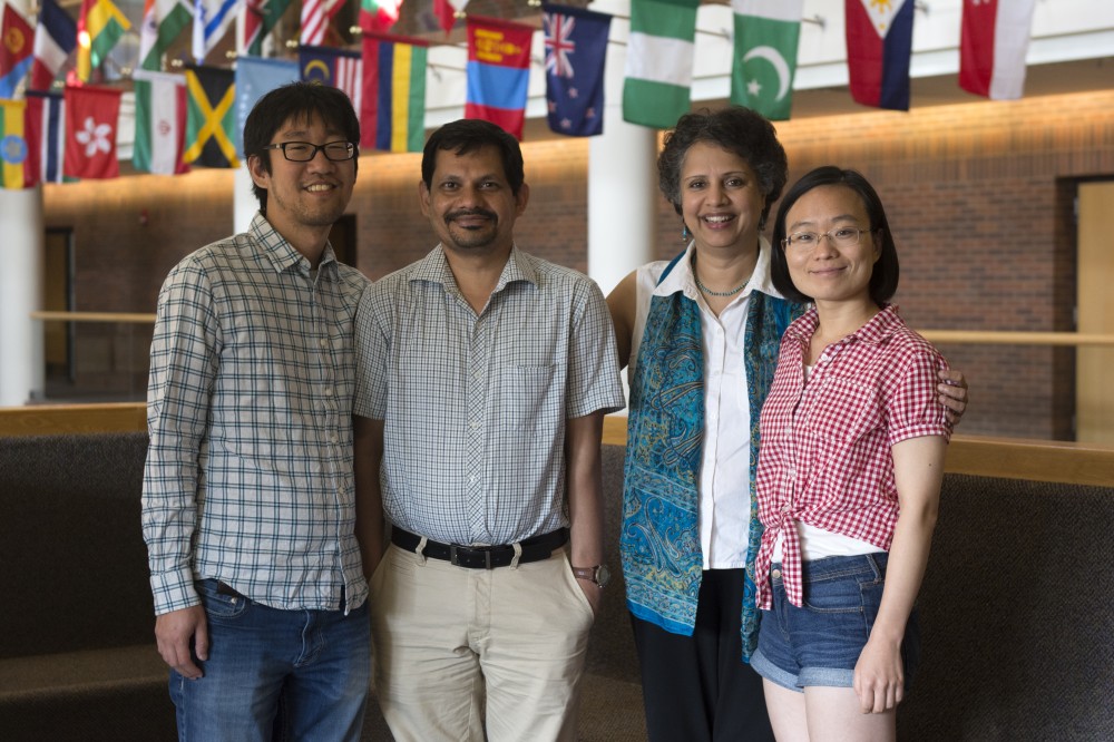 Anu Ramaswami, second from the right, poses with Andrew Fang, Ajay Singh Nagpure, and Kangkang Tong, co-authors of her recent research in the Humphrey School of Public Affairs on Friday, Sept. 22.