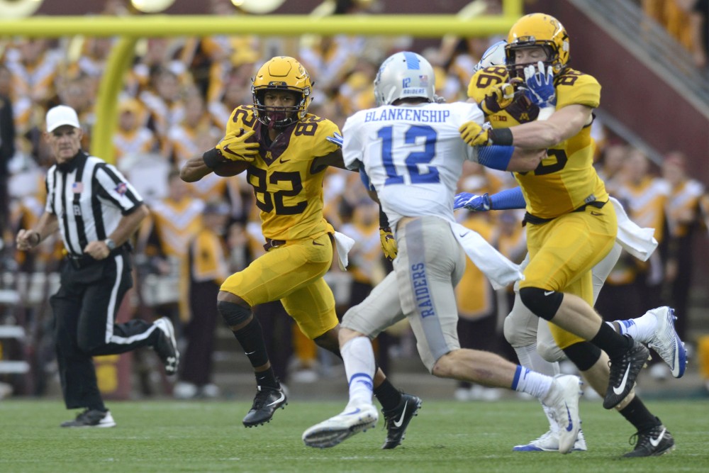 Wide receiver Demetrius Douglas runs with the ball against Middle Tennessee on Sept. 16 at TCF Bank Stadium. 