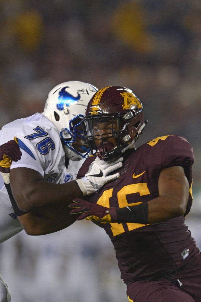 Defensive lineman Winston DeLattiboudere pushes against a Buffalo player on Thursday, Aug. 31, 2017 at TCF Bank Stadium in Minneapolis, Minn. The Gophers beat Buffalo 17 to 7. 