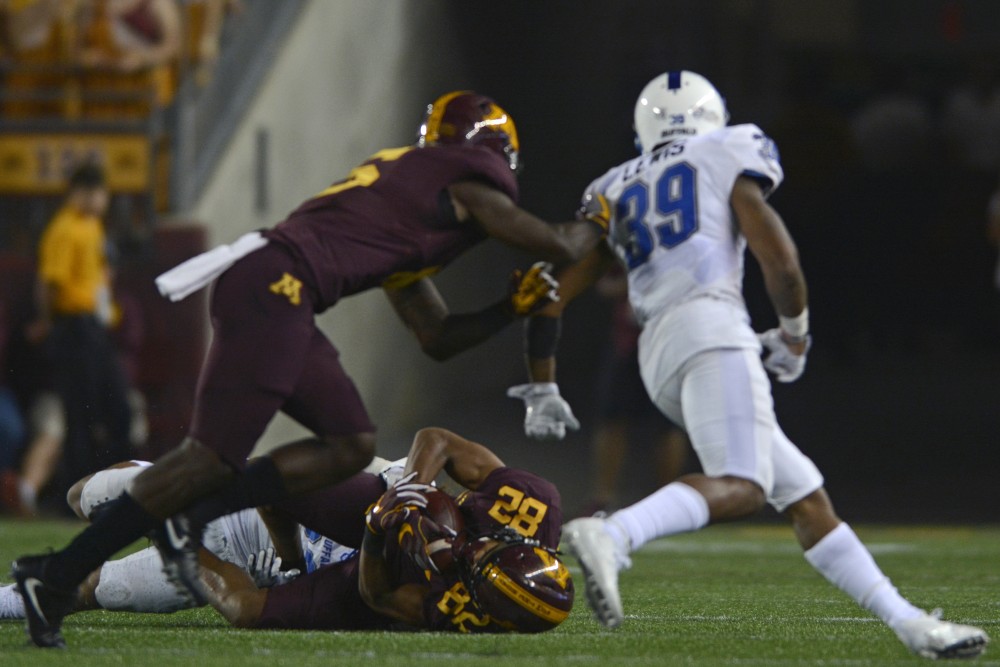 Running back Jonathan Femi-Cole dives for a pass on Thursday, Aug. 31, 2017 at TCF Bank Stadium in Minneapolis, Minn. The Gophers beat Buffalo 17 to 7. 