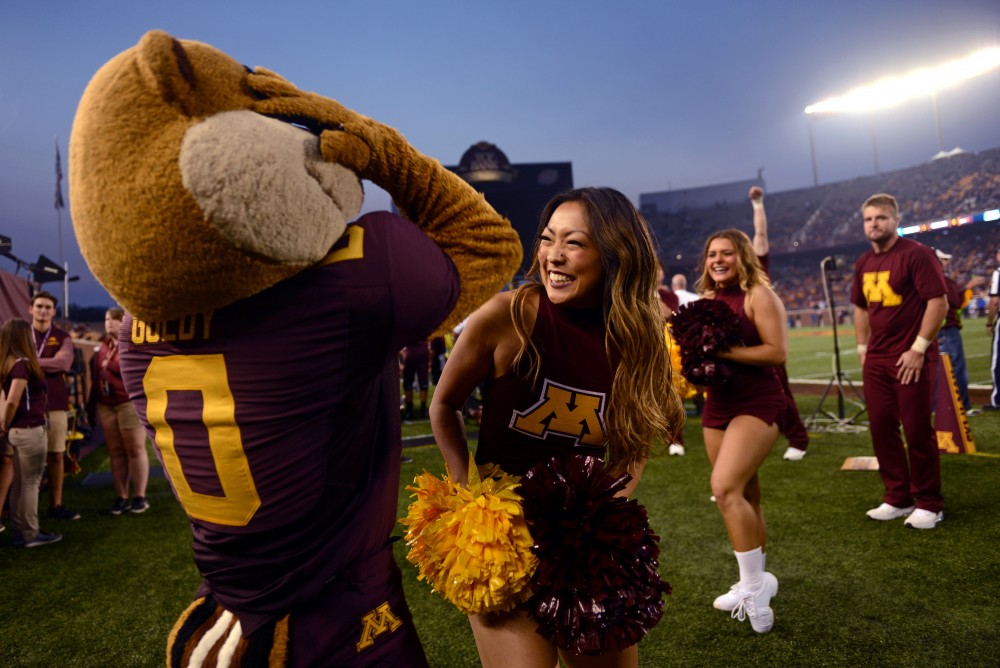 Goldy the Gopher interacts with cheerleaders at TCF Bank Stadium on Thursday, August 31, 2017.