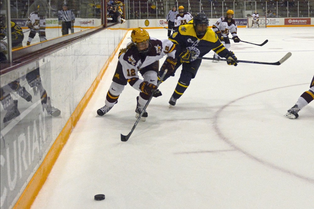 Freshman forward Grace Zumwinkle chases after the puck during a game against Merrimack at Rider Arena on Sept. 29.