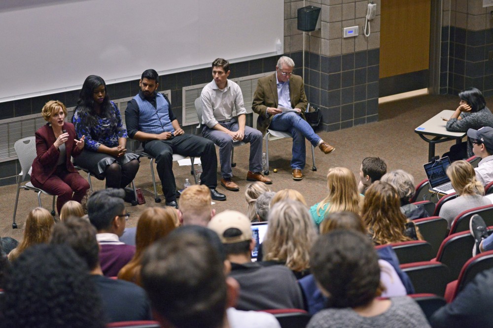 Women for Political Change, a UMN student group leads their mayoral forum in the Molecular Cell Biology Building on East Bank on Thursday. The group asked their own questions as well as questions tweeted in from audience members. 