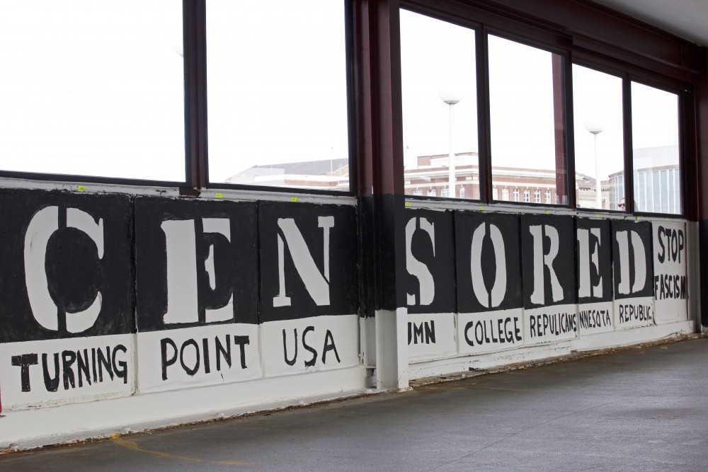 The murals for Turning Point USA, UMN College Republicans and the Minnesota Republic seen after they were repainted by the groups on the Washington Avenue Bridge on Tuesday. 