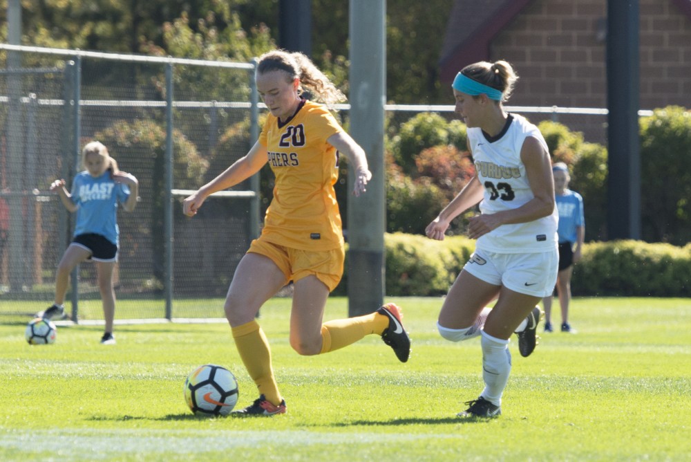 Forward April Bockin carries the ball during the Gophers game against Purdue at Elizabeth Lyle Robbie Stadium on Oct. 8.