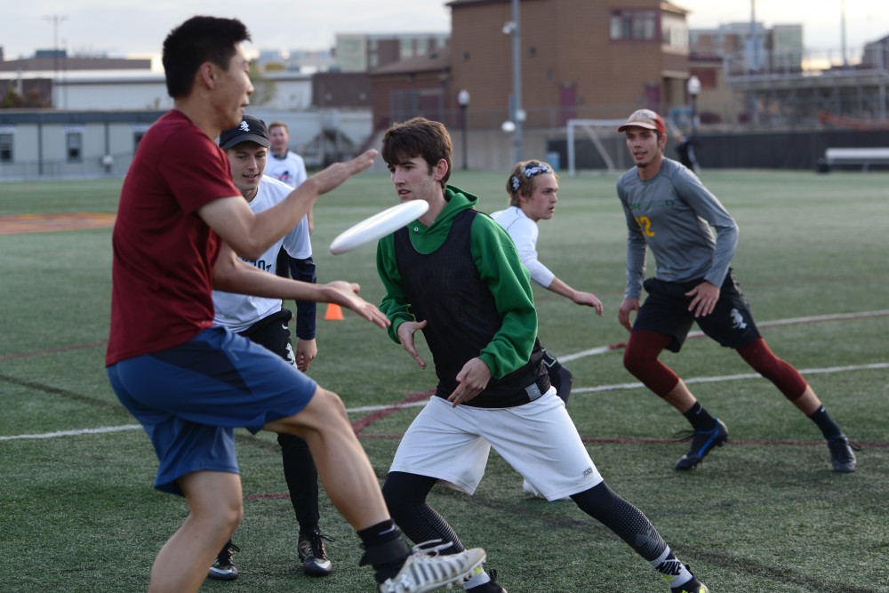 The mens ultimate frisbee team representing the University of Minnesota scrimmage against one another during practice on Wednesday, Oct, 11.