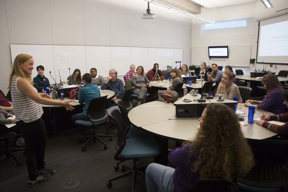 Associate Professor in Biology, Teaching and Learning Sehoya Cotner leads a discussion with biology professors from around the country about the Equity and Diversity in Undergraduate STEM initiative in Bruininks Hall on Saturday.