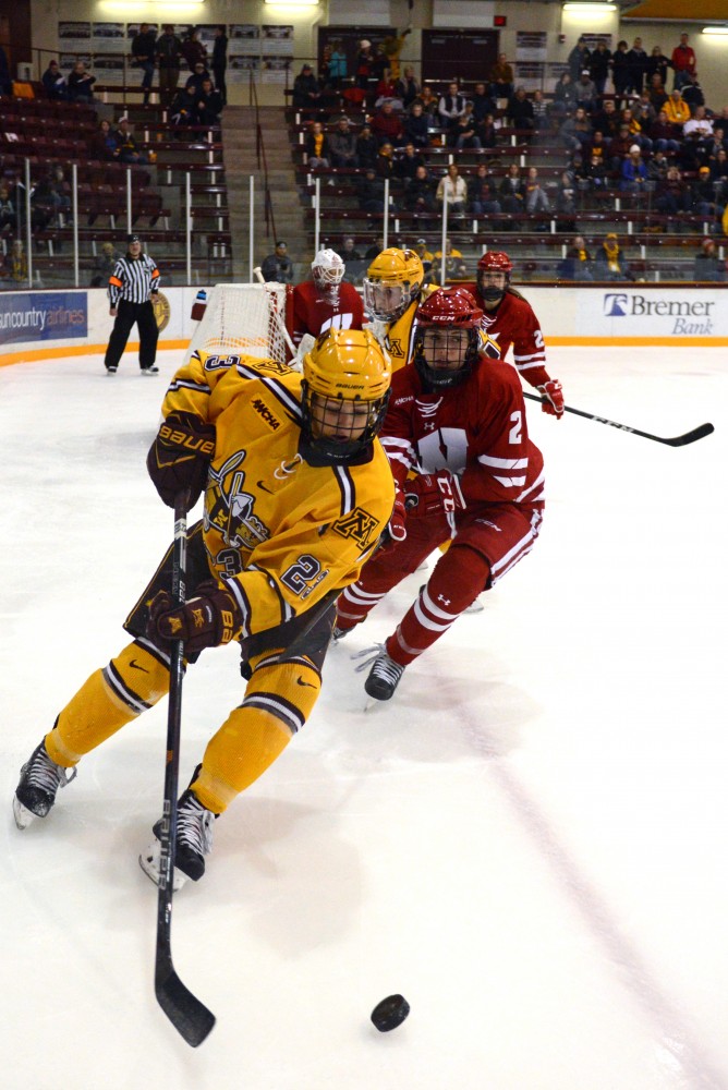 Forward senior Caitlin Reilly skates down the ice with puck at Ridder Arena on Sunday, Oct. 29. 