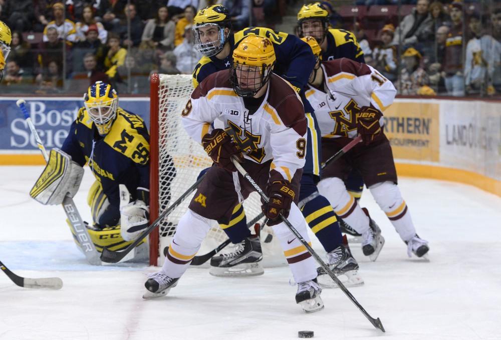 Gophers forward Mike Szmatula looks for a passing outlet against Michigan on Friday, Jan. 13, 2017 at Mariucci Arena. 