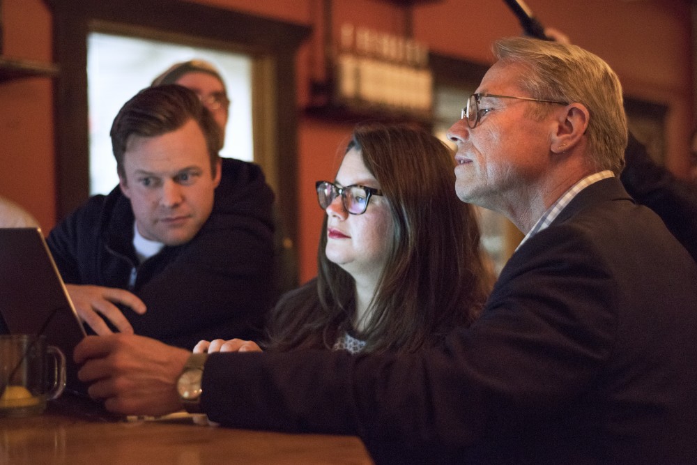 Raymond Dehn looks over election results during his Election Day party at Du Nord Craft Spirits on Nov. 7.